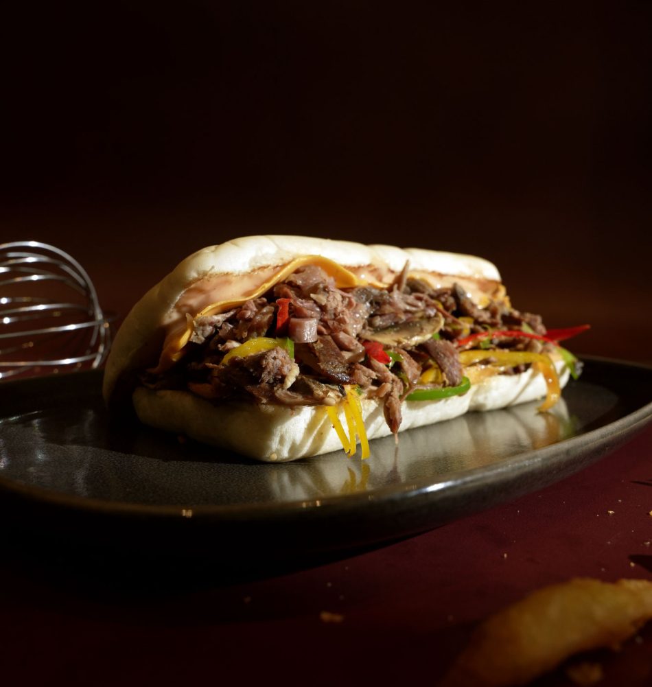 Multigrain bread, beef brisket, <br>
bell peppers, cheese